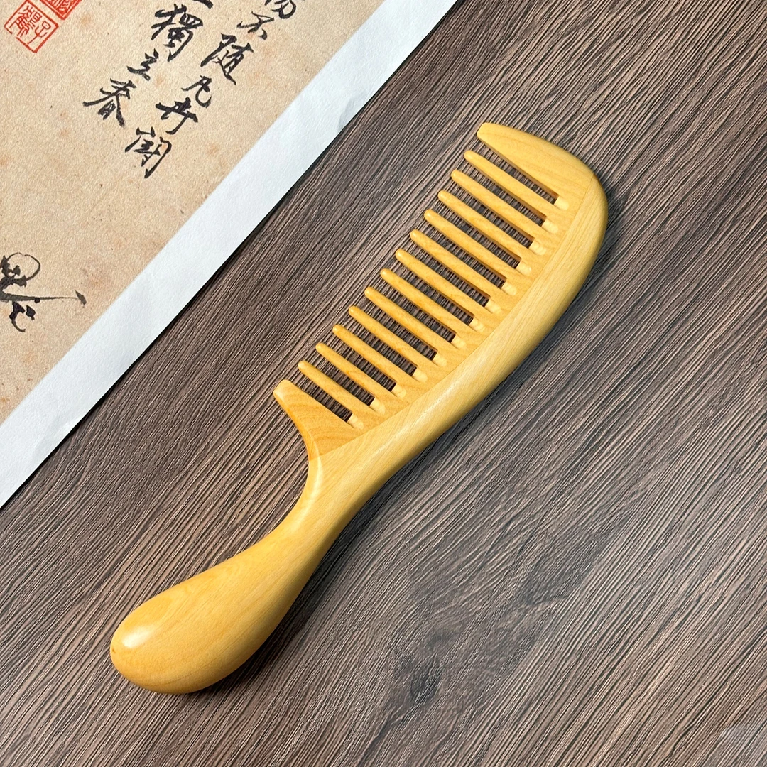 正品黄杨木梳男女士长发家用按摩送人礼物高档榫桙手工木梳宽齿