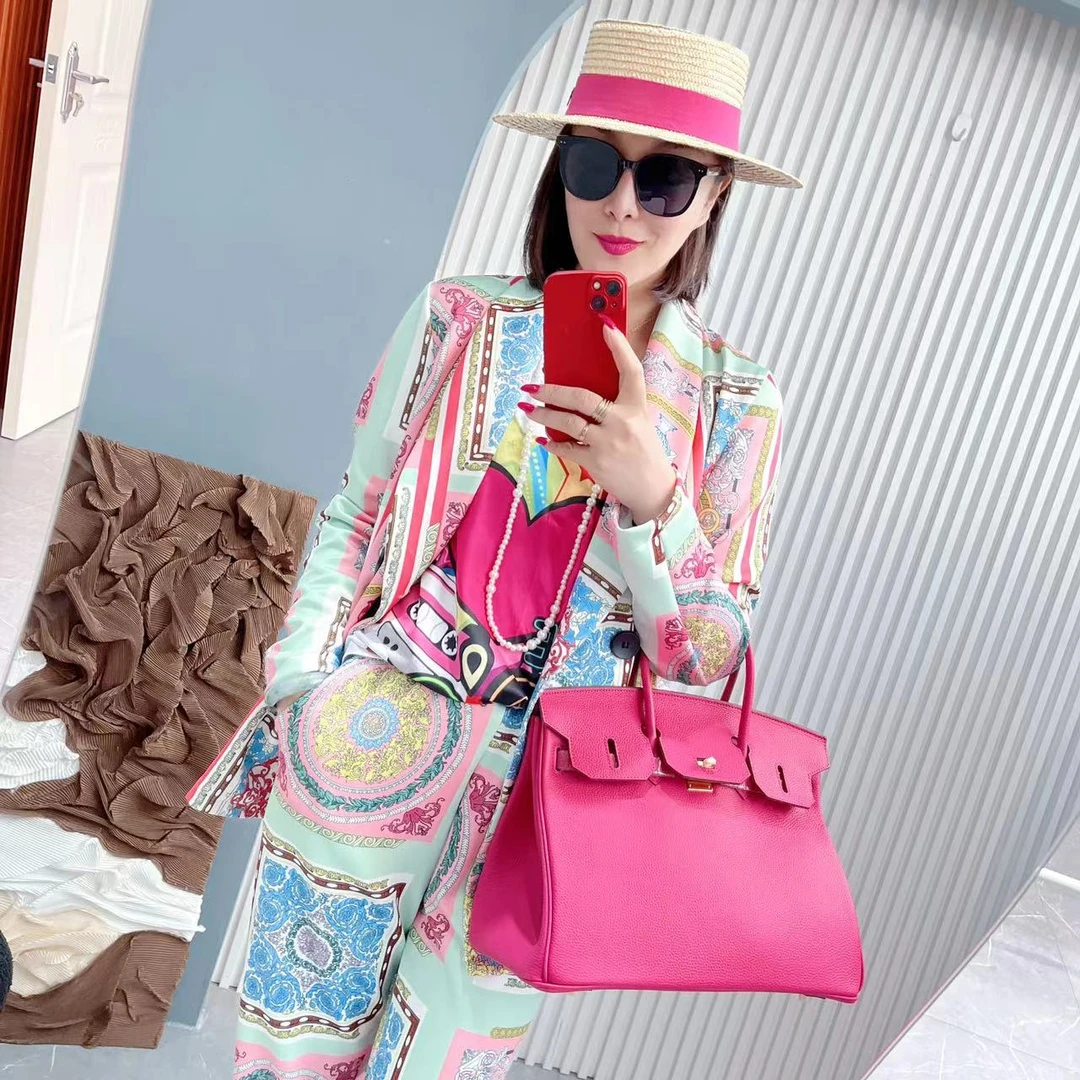 W0311春装气质时尚不定位彩色印花弹力氨纶空气层九分收脚裤套装