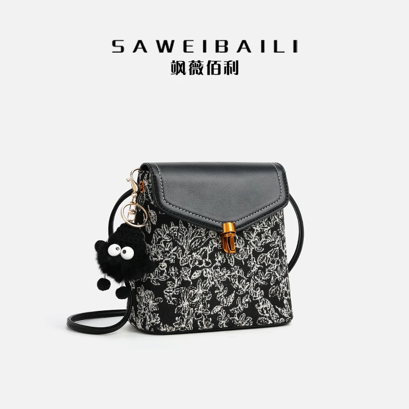 圆珠锁花纹黑水桶包-60220-2百搭时尚轻奢单肩印花