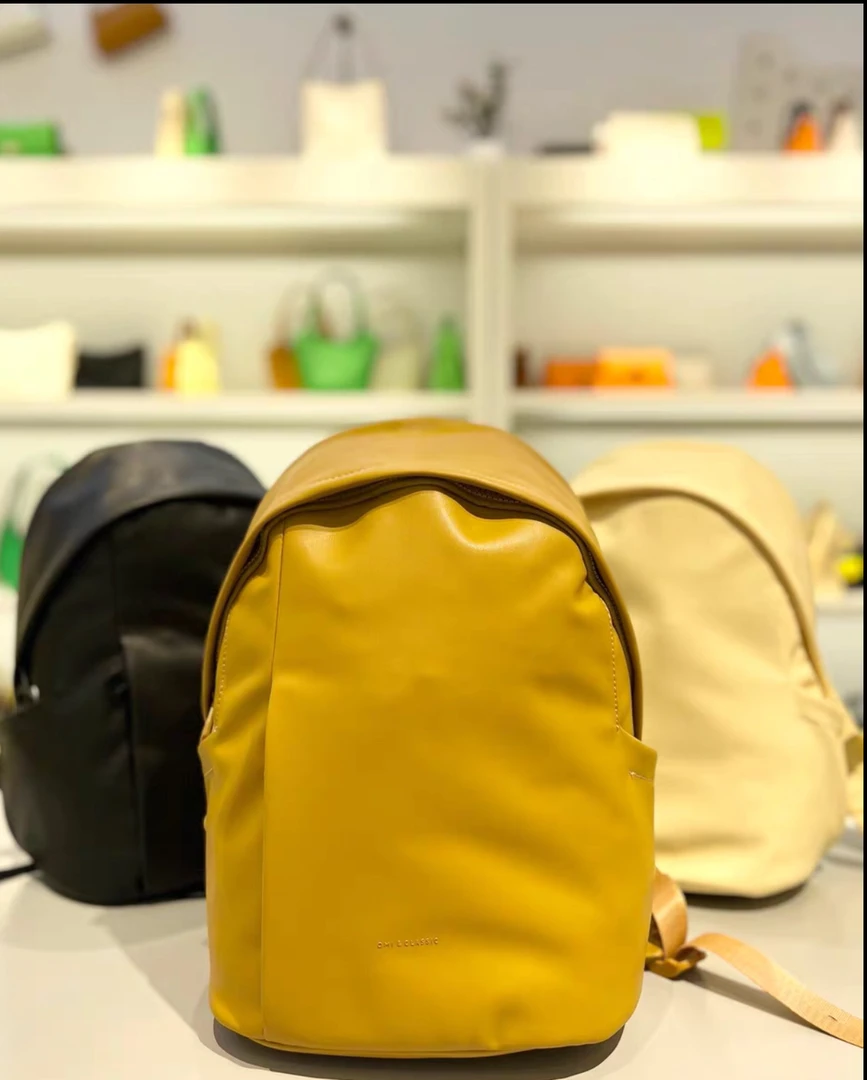 OMI欧米女包新款时尚潮流休闲运动大容量双肩包包旅行包背包