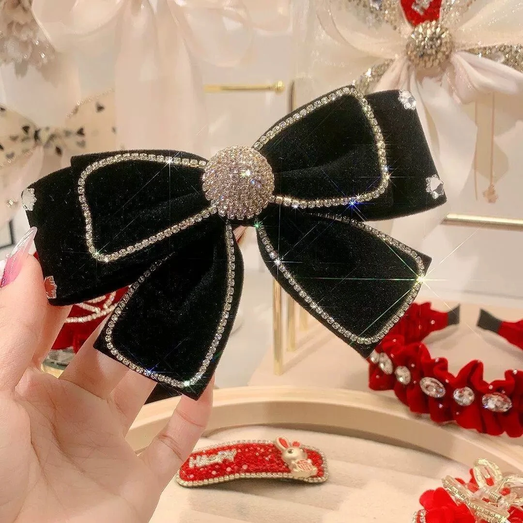 精致镶钻蝴蝶结弹簧夹A42