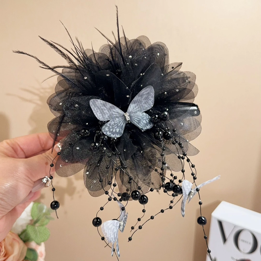 秋冬新款蝴蝶满天星花朵流苏抓夹A05