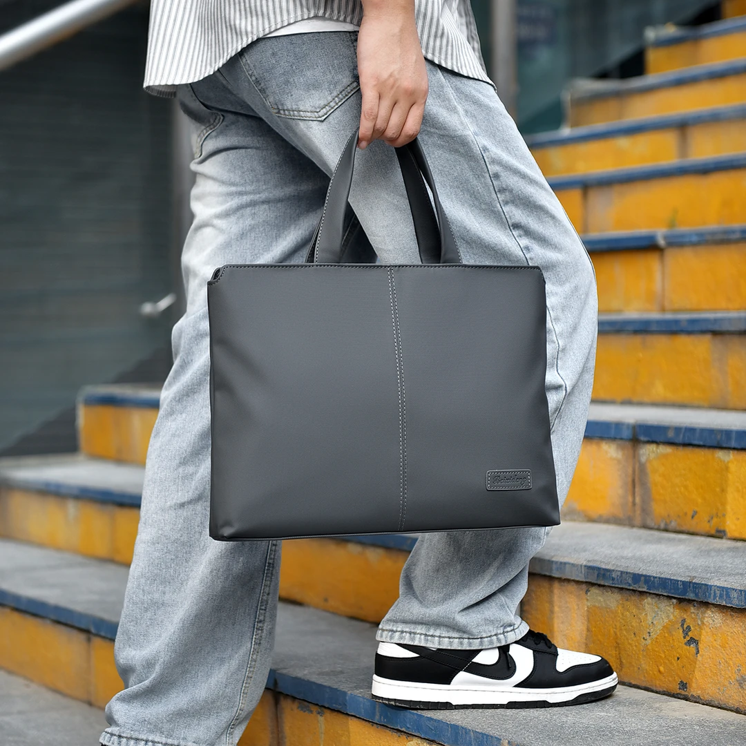 男士休闲商务手提公文包大容量电脑包A4文件会议简约书包包袋男款
