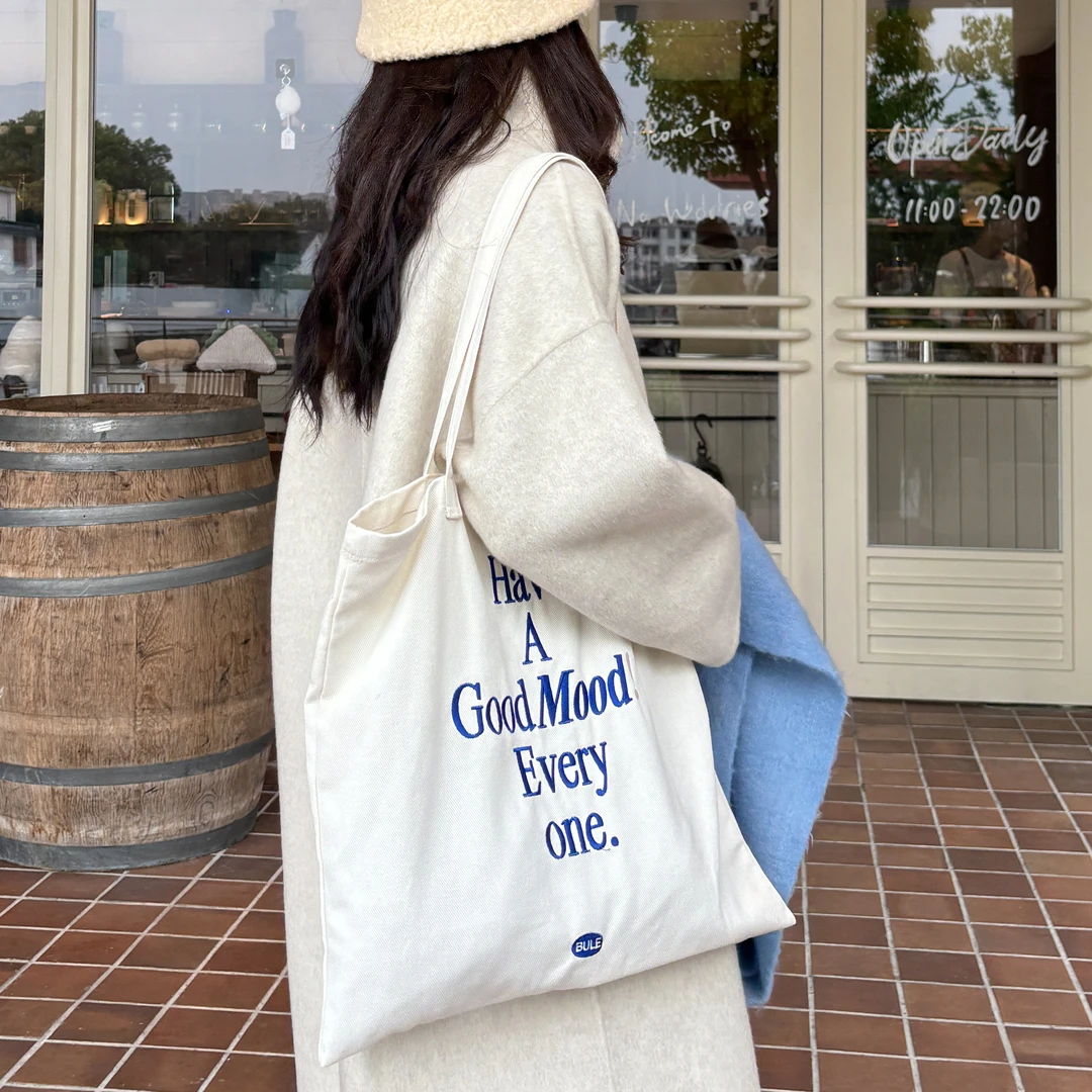 白色休闲帆布袋森系简约单肩包