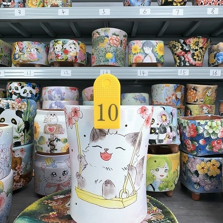 ^***?10号猫咪笔筒