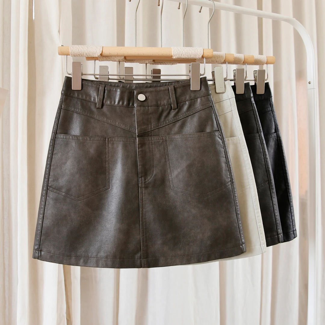 pu皮裙半身裙设计感女秋季2024新款包臀漆皮短裙PU皮裙高腰A字裙