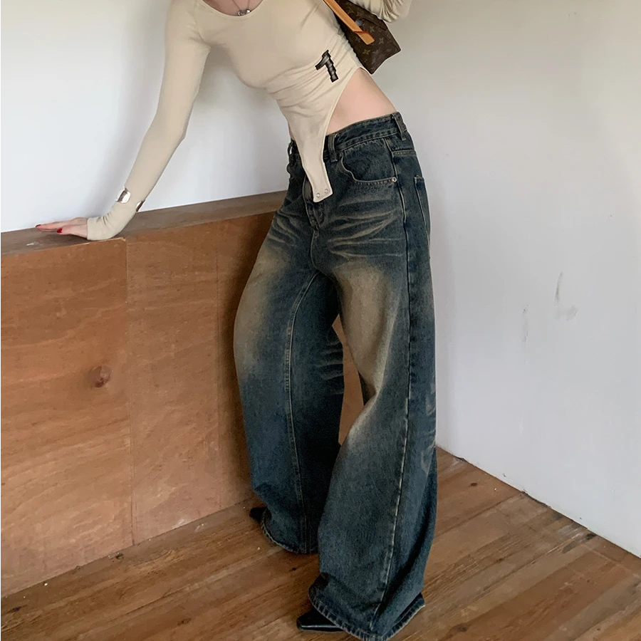 街头时髦水洗做旧阔腿直筒显瘦猫爪设计复古感牛仔裤