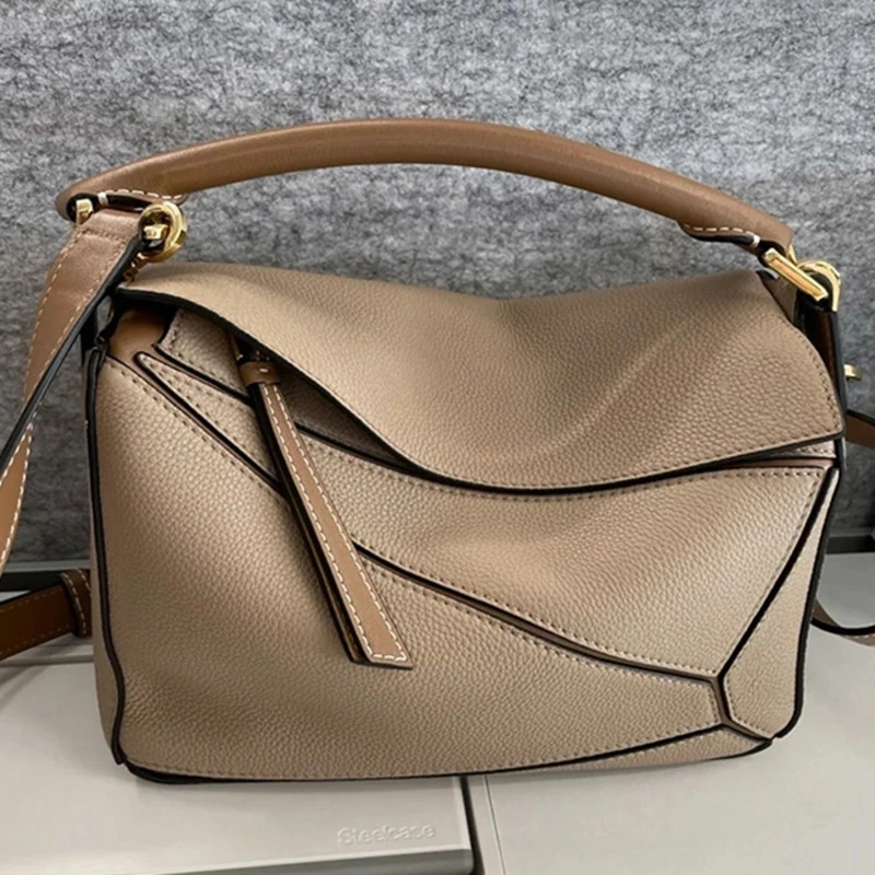 新款几何包时尚包包单肩斜跨手提头层荔枝纹牛皮休闲半手工小方包