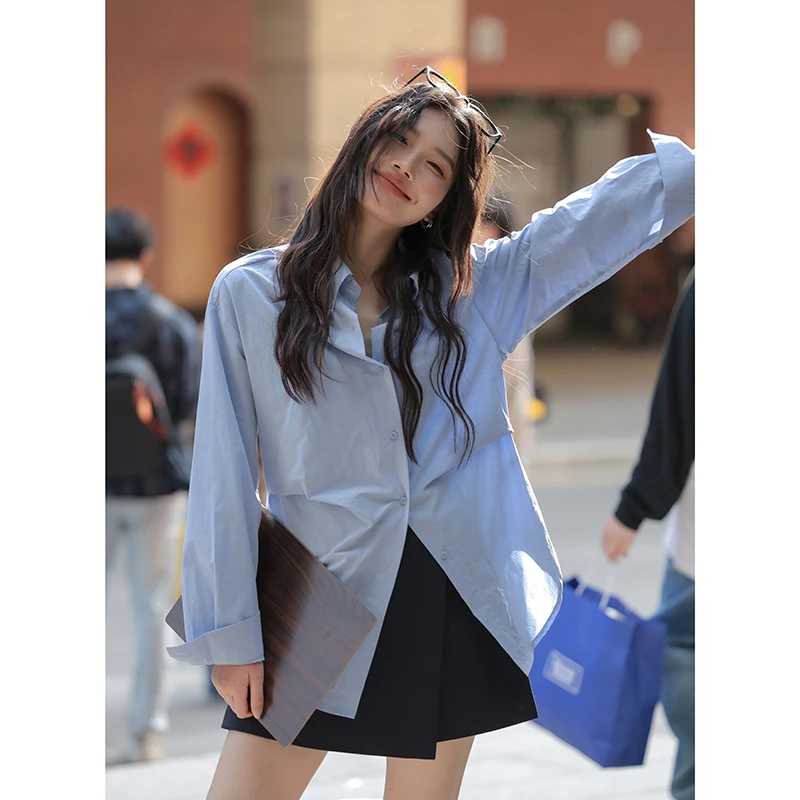 觅定蓝色衬衫女秋季衬衣法式设计感别致气质宽松长袖上衣S8042
