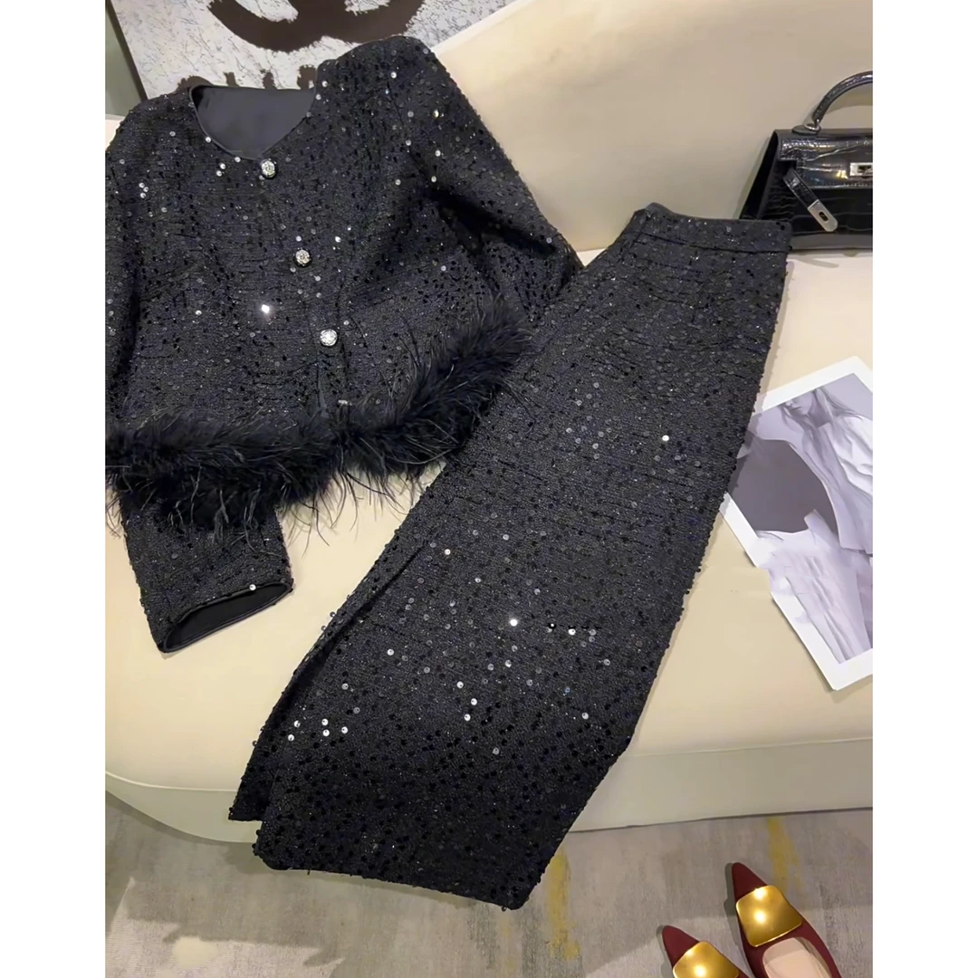 七七-气质加棉亮片重工毛毛套裙