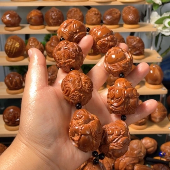 橄榄核核雕用****4瑞兽弥勒