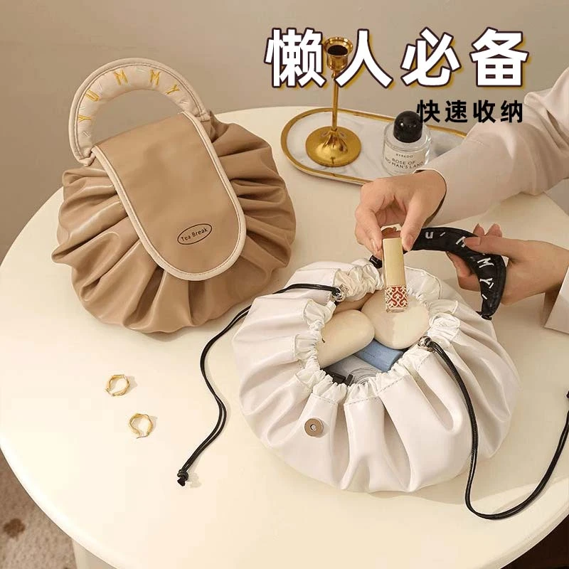 化妆包女大容量新款便携式懒人旅行收纳抽绳出差洗漱包一片式