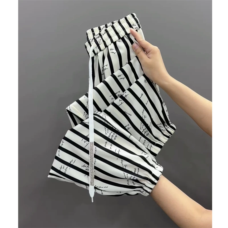 洋气条纹百搭抖抖裤新款时尚薄款宽松束脚哈伦裤小个子九分休闲裤