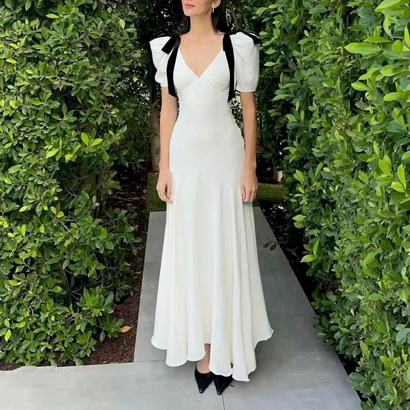 法式温柔气质肯豆同款2024年春季白色深V蝴蝶结花苞袖修身连衣裙