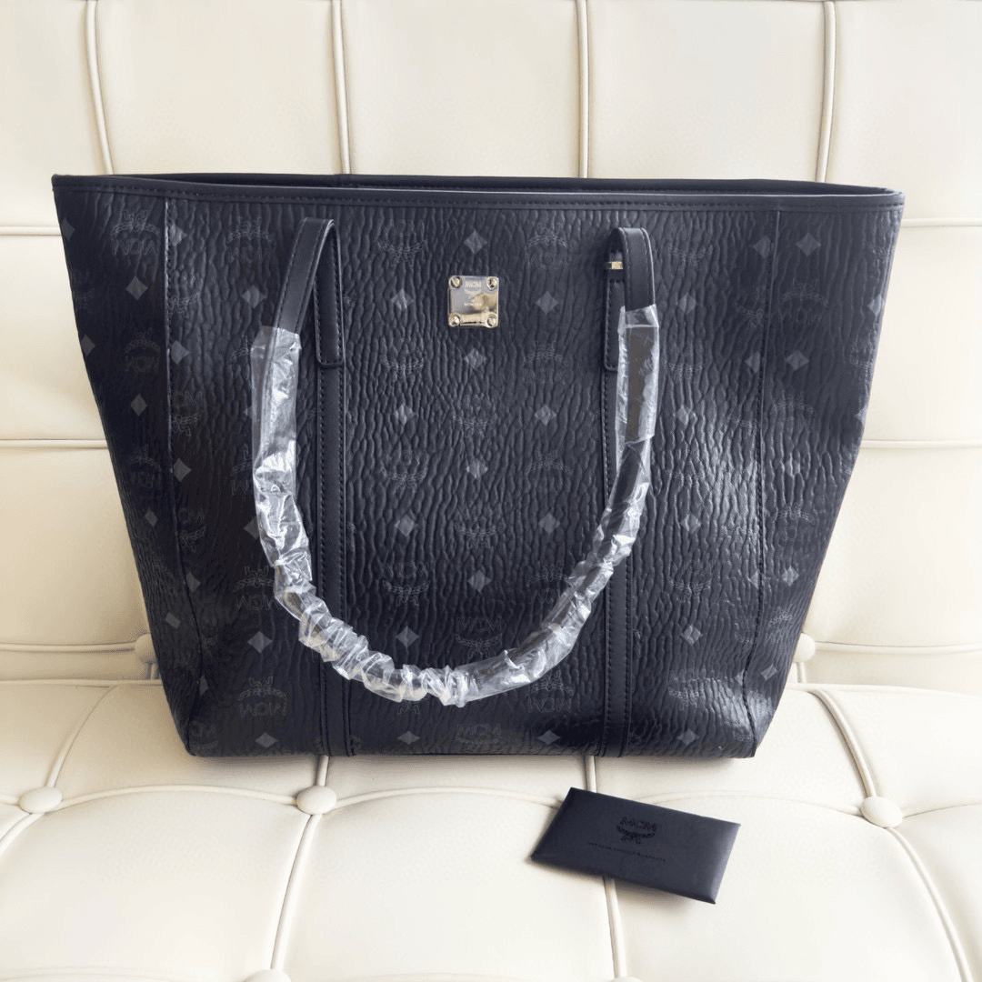 99新 MCM jsyy mcm黑花购物袋手提包 无子包