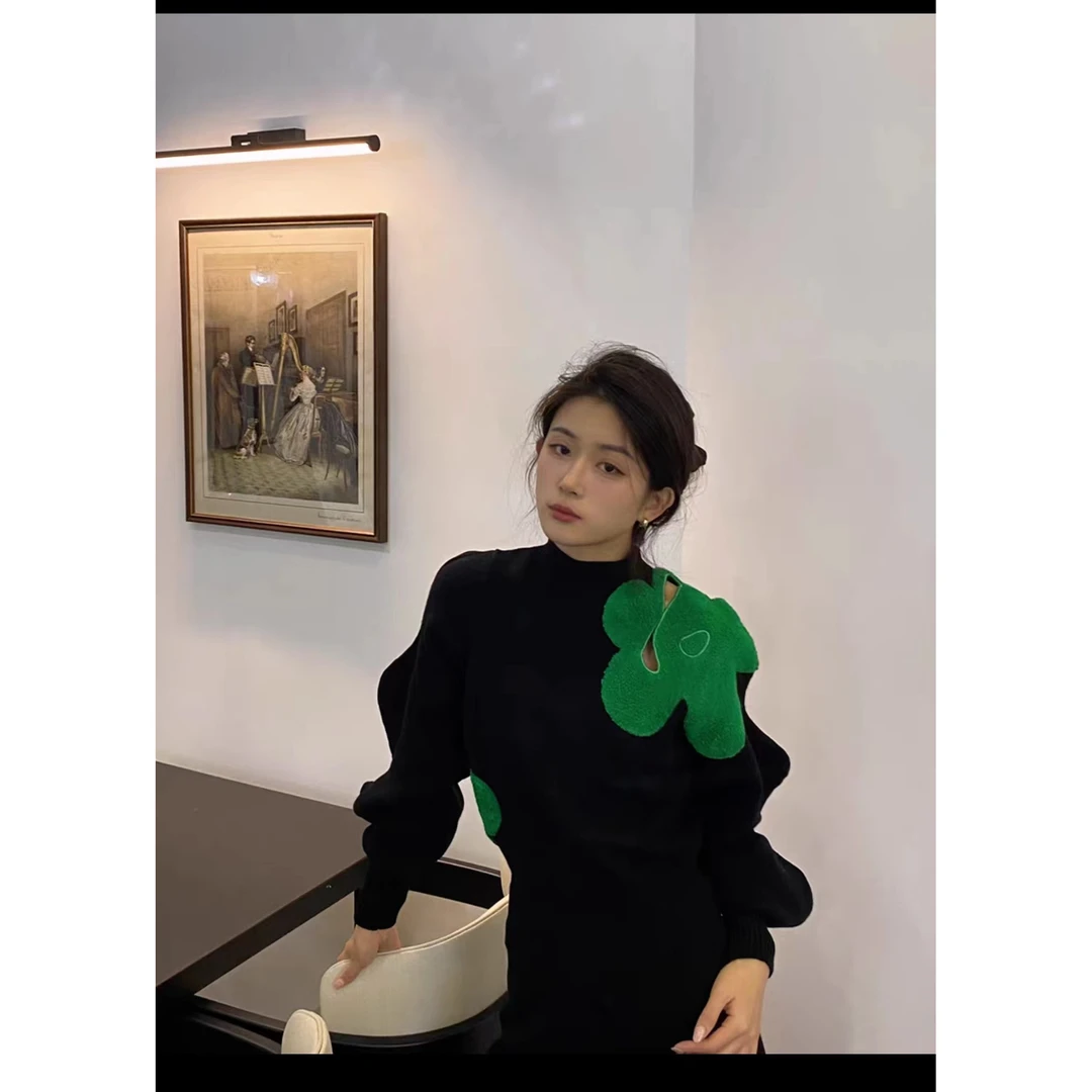 秋冬新款波浪袖镂空时尚百搭慵懒风针织毛衣2024年春季