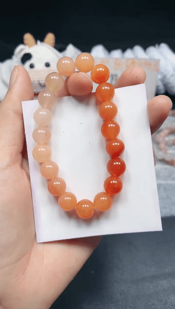 【闪购商品】石英质玉手链未镶嵌柿子红卡10