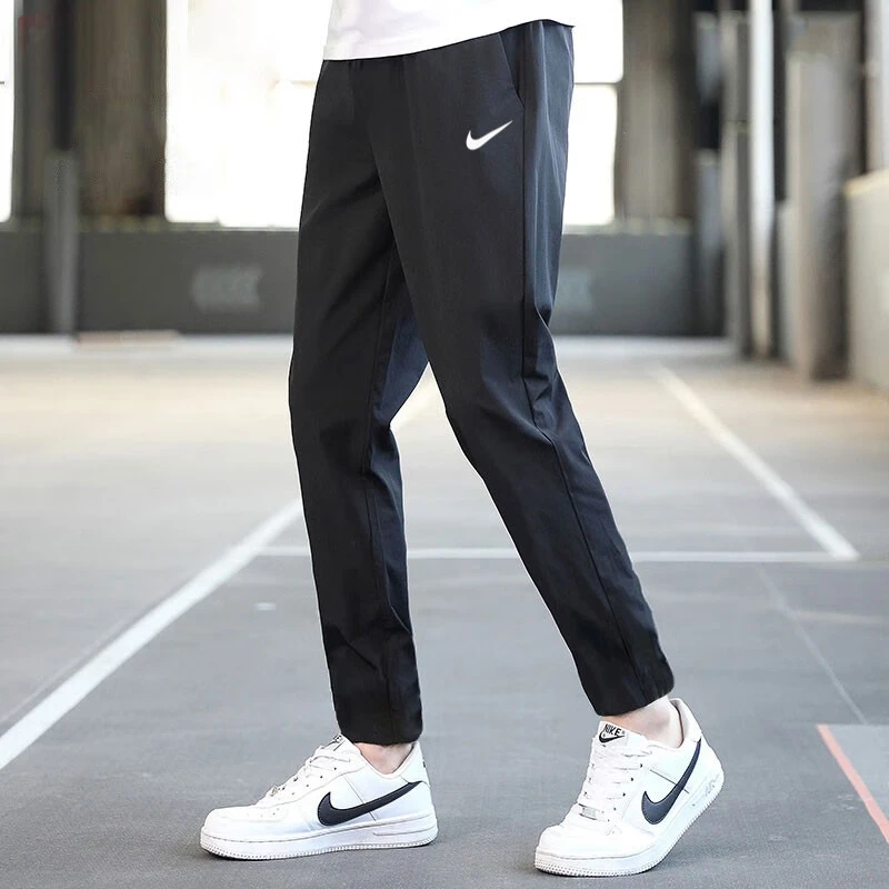 NIKE耐克运动裤男装秋流光风休闲宽松训练跑步裤DM6627