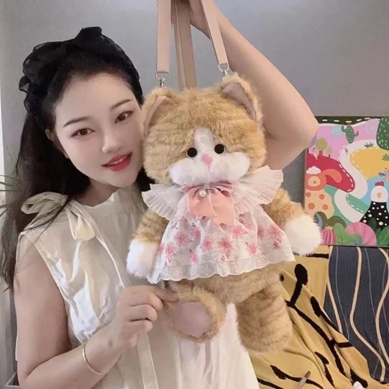 猫咪玩偶背包可爱毛绒玩具娃娃仿真金渐层安抚公仔双肩包生日礼物