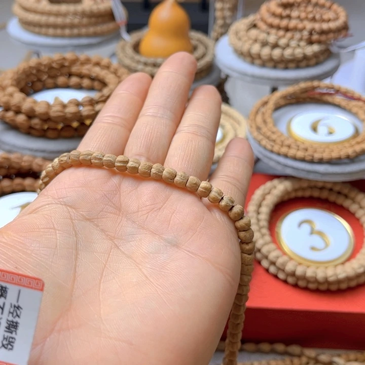 柏香籽/百香籽手串皮*?