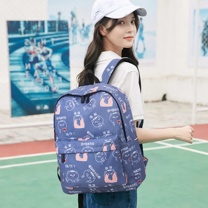 中小学生双肩包校园印花背包防水大学生日系涂鸦可爱软妹少女书包