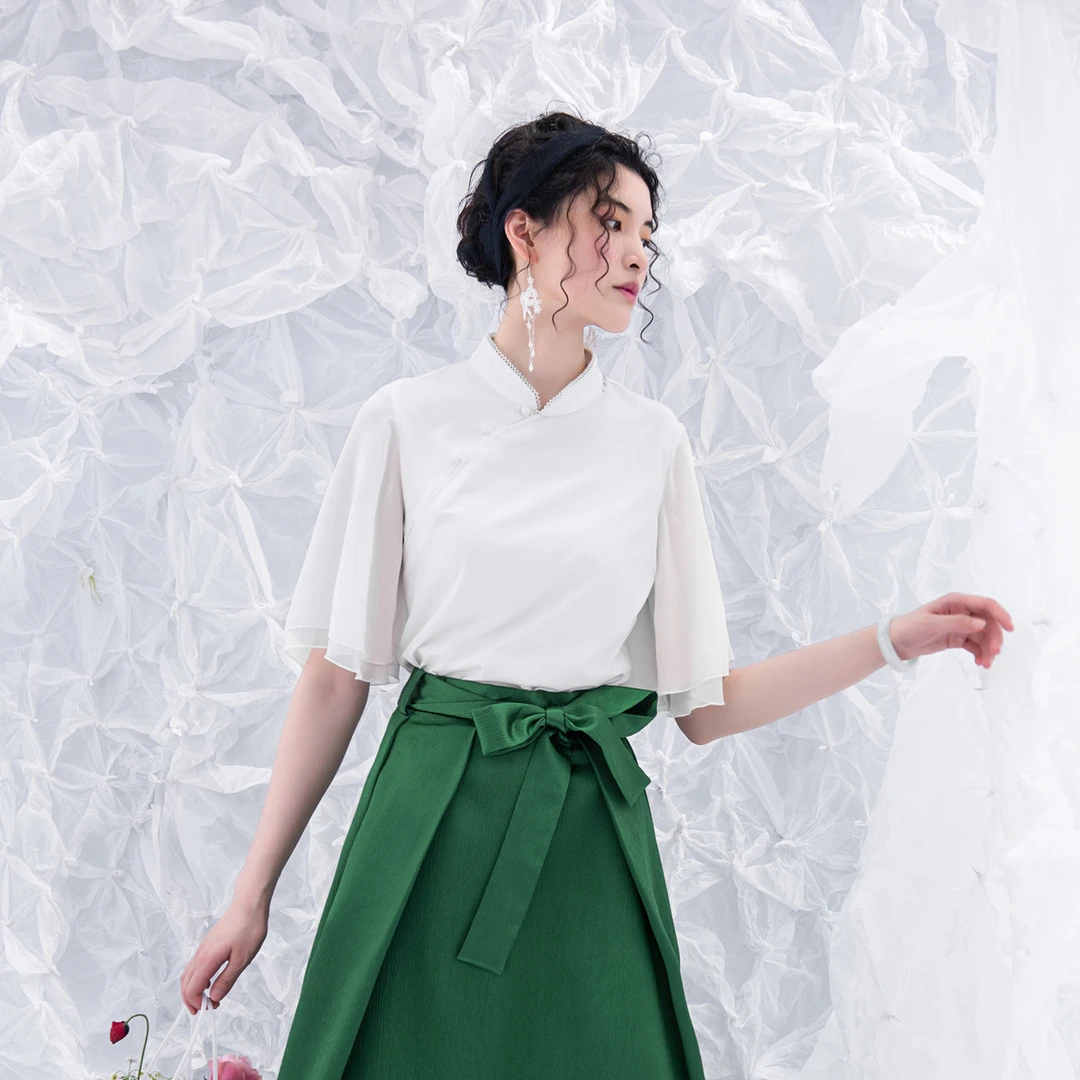 2022夏季新品白色复古美容师短袖针织衫上衣女1922424气质时尚