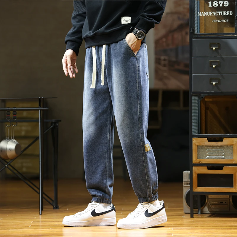 2025年夏季束脚牛仔裤男潮流百搭水洗弹力修身男士直筒韩版牛仔裤