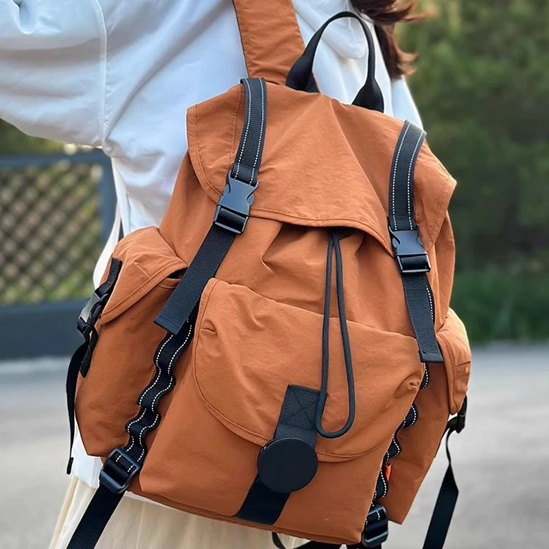 探屿潮牌户外运动登山包大容量旅行双肩包女轻便电脑背包学生书包