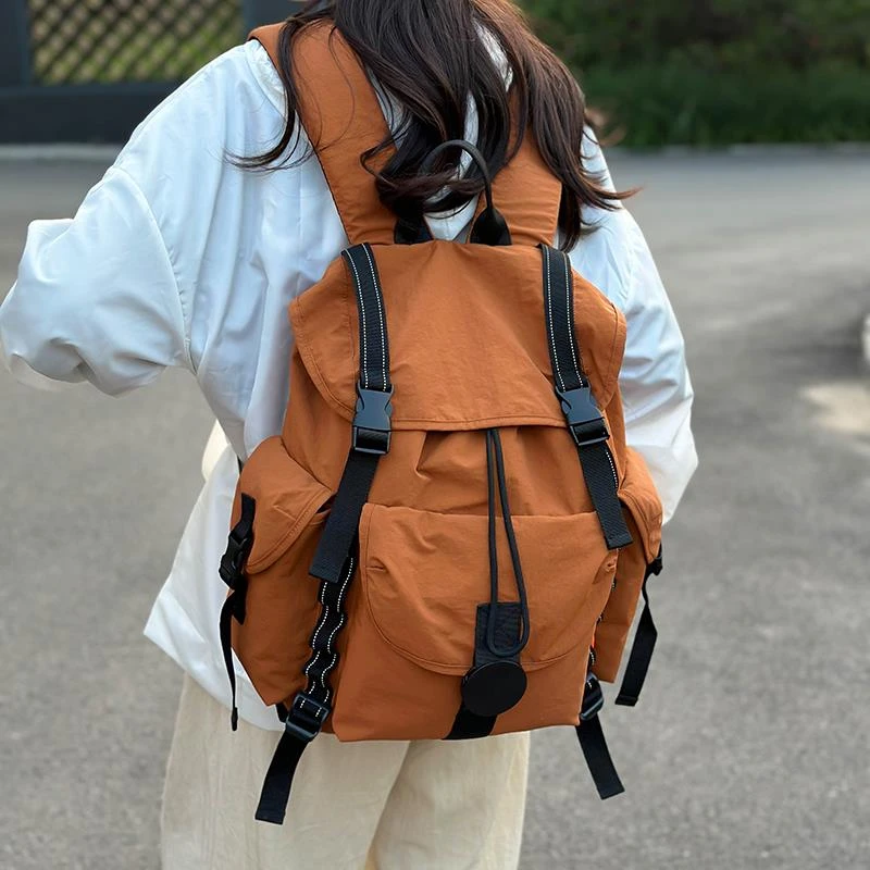 探屿双肩包旅游轻便登山包户泼外防水背包通勤休闲初中高中生书包