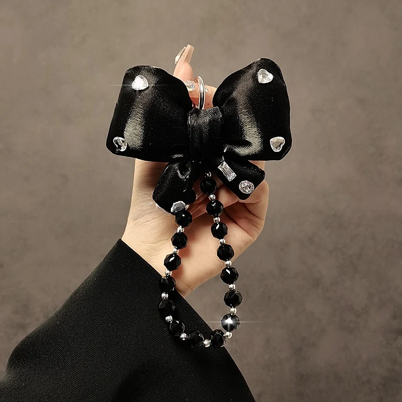 时尚小香风水钻蝴蝶结手机挂绳水晶串珠手提链短款手腕挂件手机链