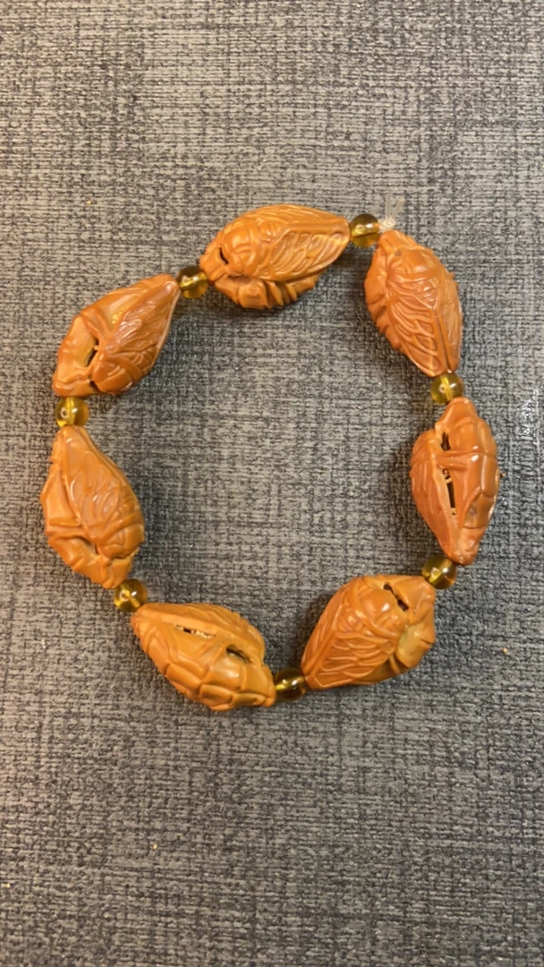 一鸣惊人 橄榄核雕刻 镂空核雕手串YMJR