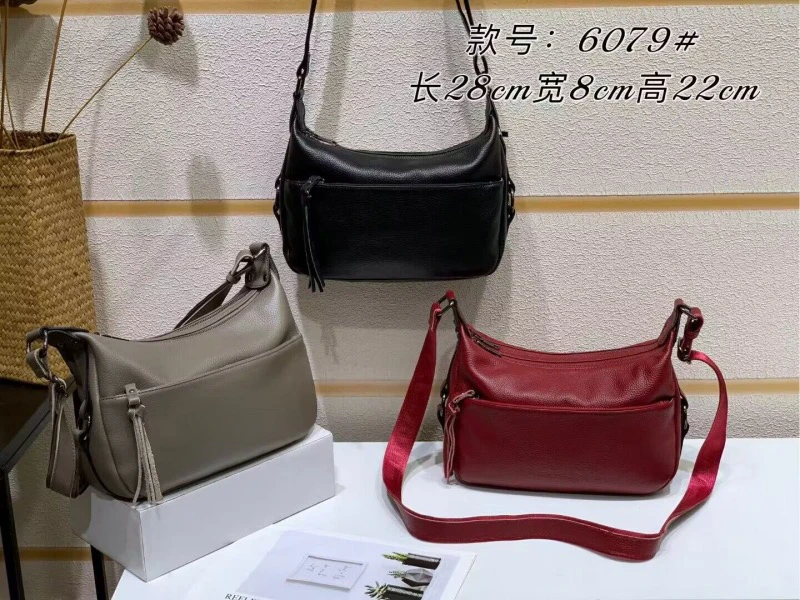 6079｜头层进口TOGO小牛皮时尚休闲饺子包流苏小拉链