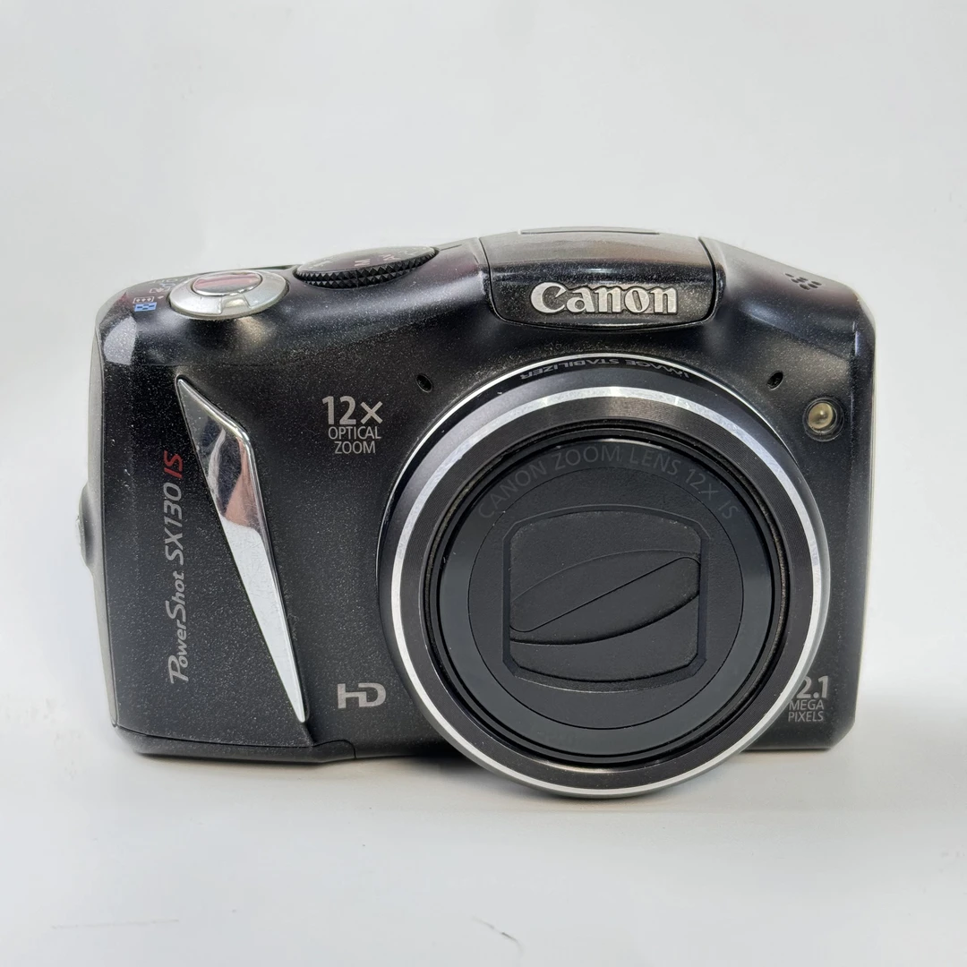 95新 Canon/佳能 sx130长焦自备5号电池1210w像素12x光变ccd相机