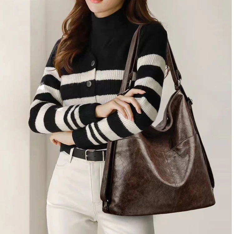 全皮包包女2024新款百搭高级单肩大容量通勤单肩包外出双肩托特包