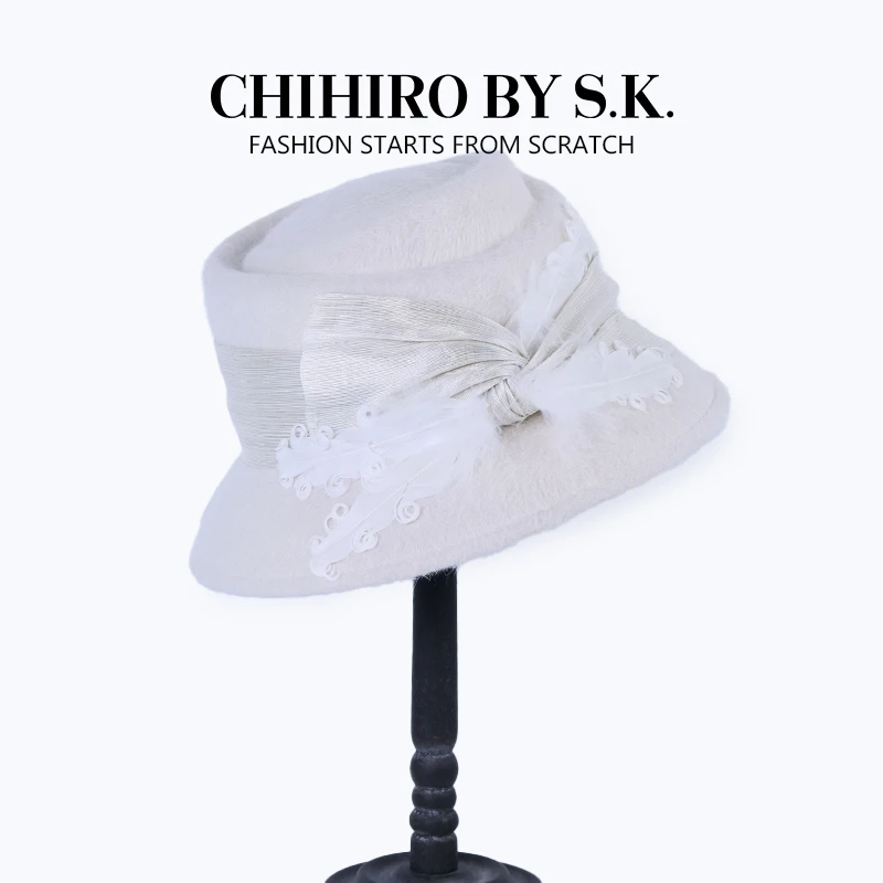 新帽馆时尚百搭简约轻奢透气优雅平顶冬日午后羽毛盆帽