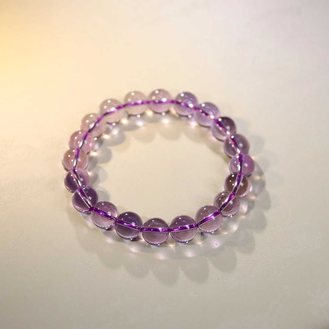 <丁香>高透体玻利维亚紫卡10-11mm水晶手串+