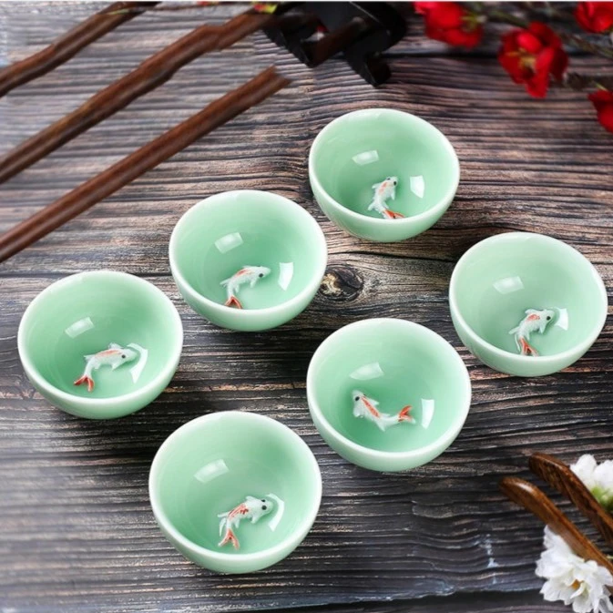 青花瓷冰裂釉浮雕带鱼品茗茶杯单杯