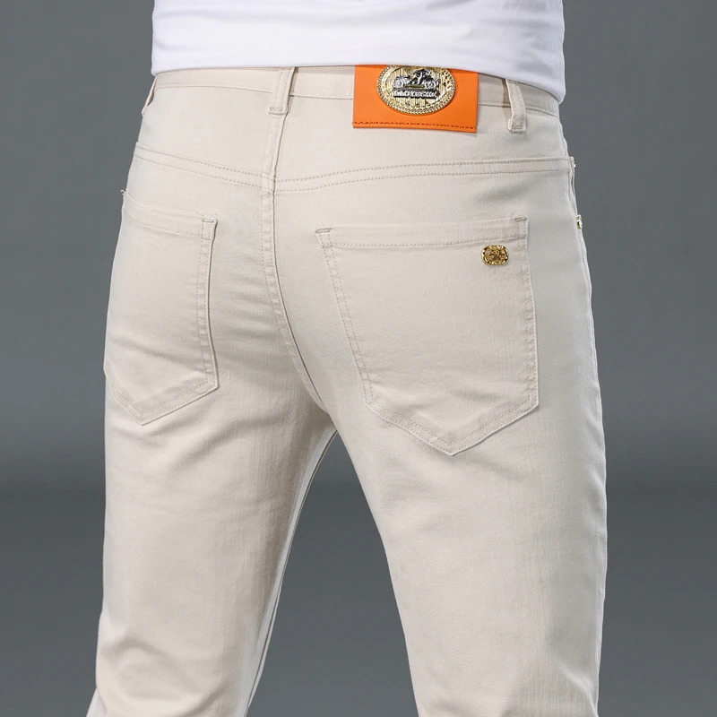 高端米杏色潮流牛仔裤男修身小脚裤百搭弹力夏季薄款休闲浅色长裤