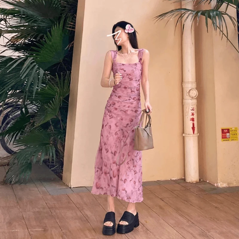 0754粉色海边度假碎花吊带连衣裙女2025夏季新款小众气质无袖长裙
