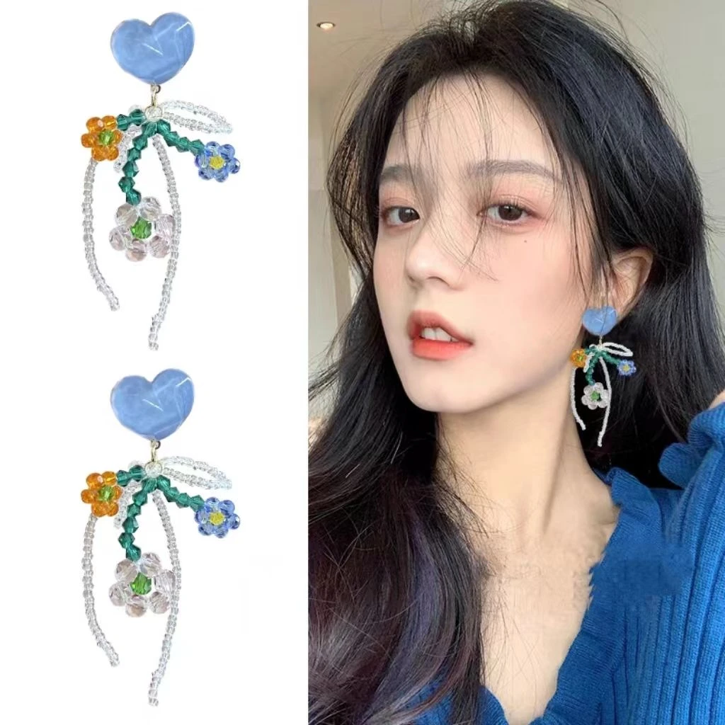 海盐橘子网红蓝色串珠花朵独特耳环显脸小蝴蝶结女2024年新款