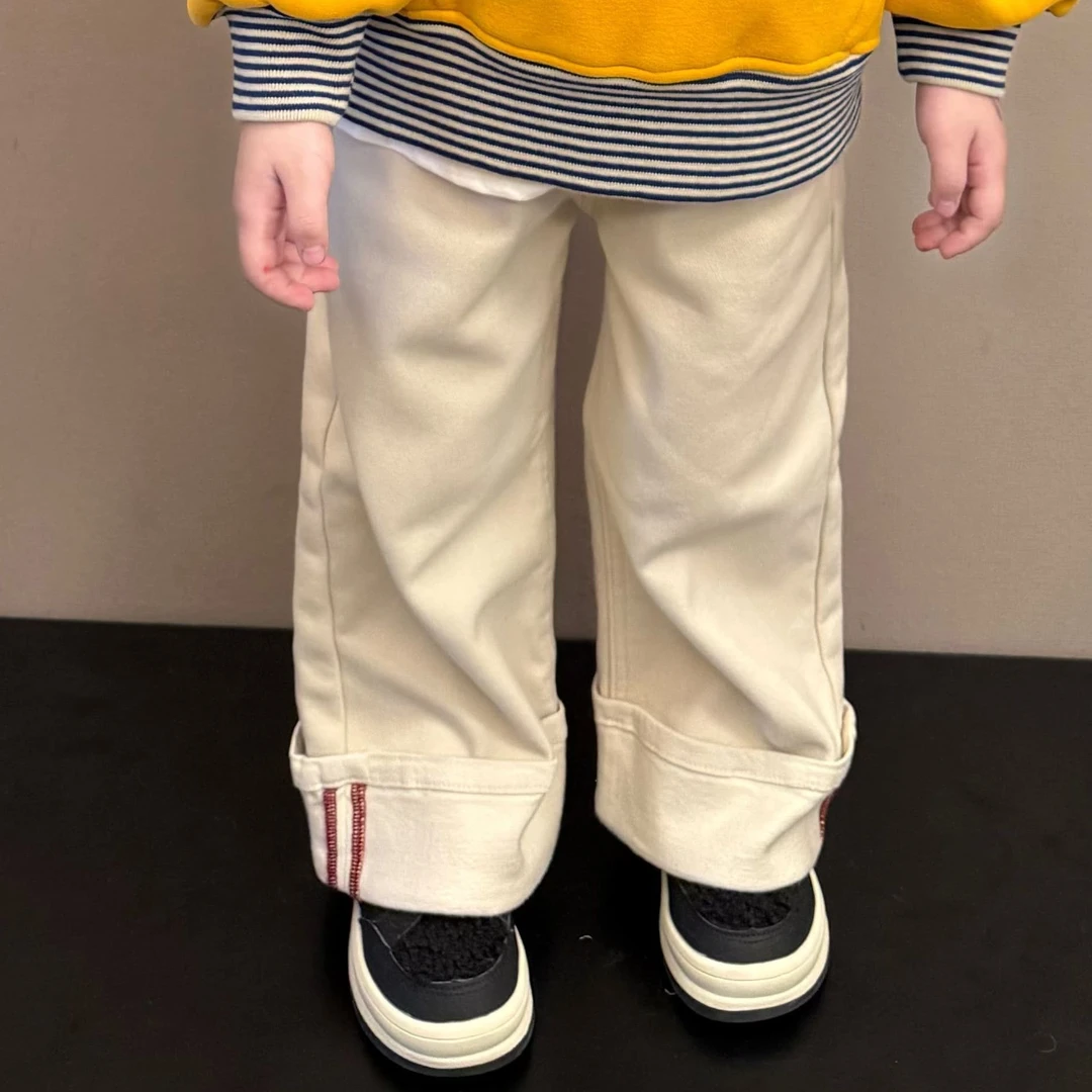 大金定制儿童秋冬新款米白色翻边红条一体绒宽松冬季时尚拖地裤