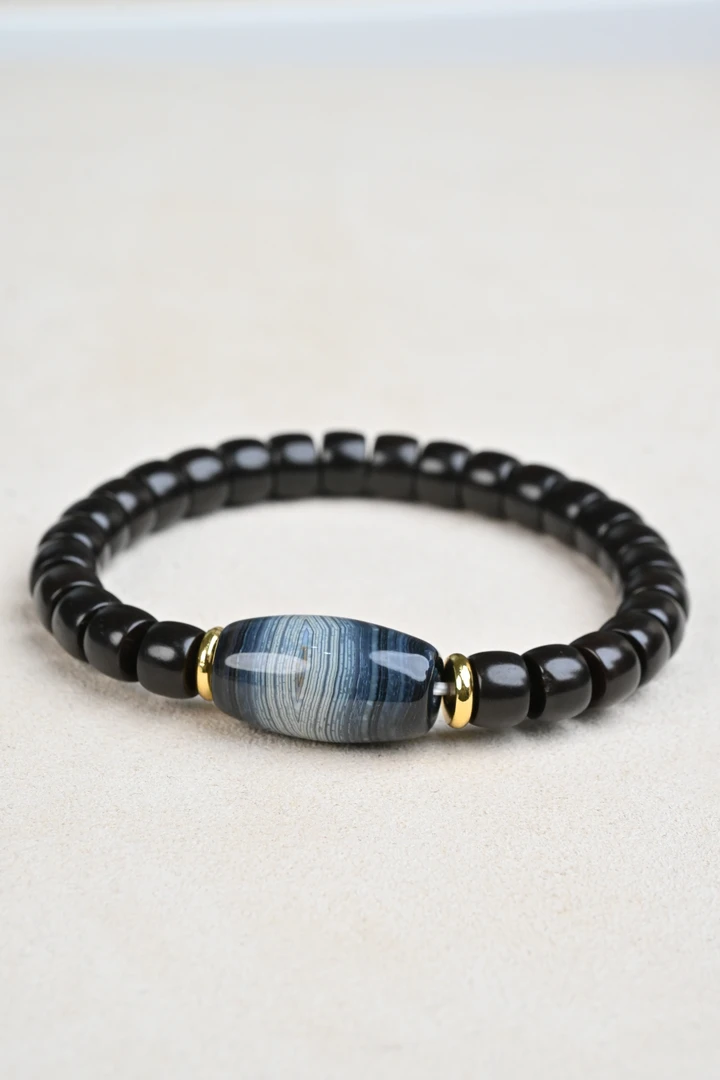 缠丝玛瑙椰蒂手串b-11尺寸23*13