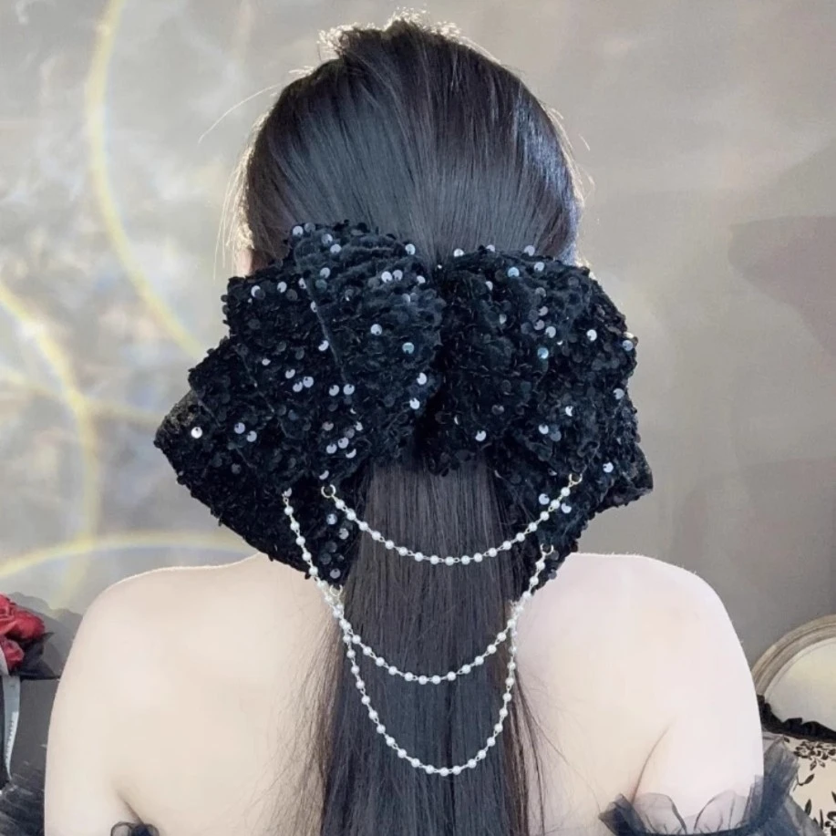 超仙亮片蝴蝶结流苏抓夹半扎发发夹后脑勺显发量弹簧夹高颅顶头饰