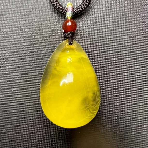 荧光琥珀吊坠琥珀蜜蜡吊坠琥珀蜜蜡水滴吊坠意境琥珀吊坠妖花琥珀