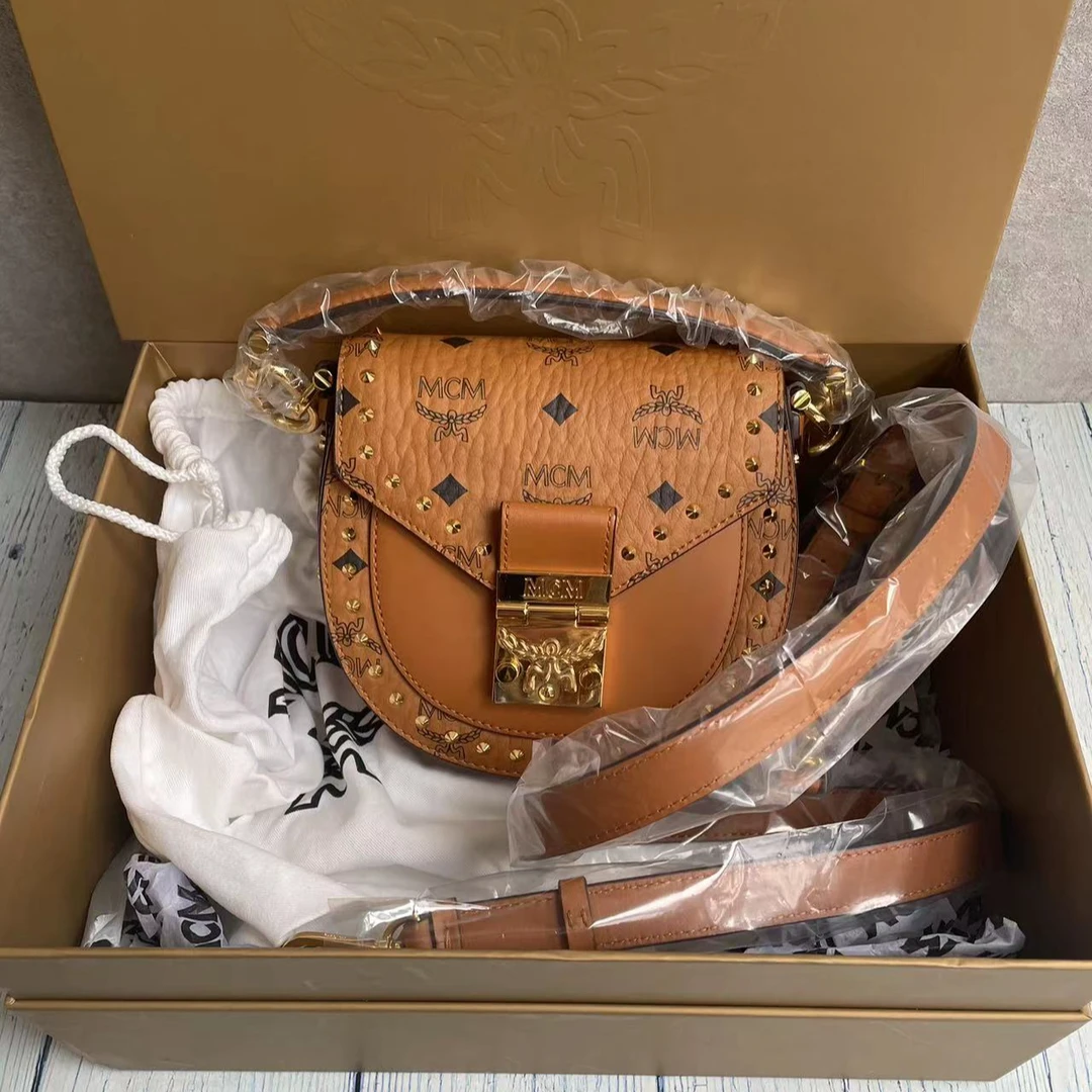 99新 MCM mcm干邑色迷你小铆钉马鞍斜挎包存放品