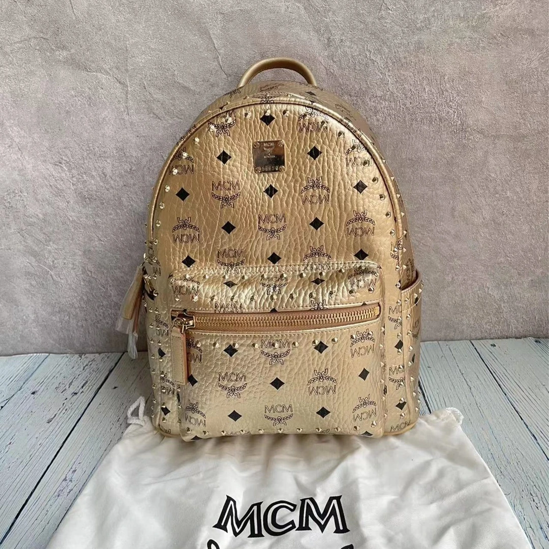 99新  mcm柏林金侧钉小号双肩包