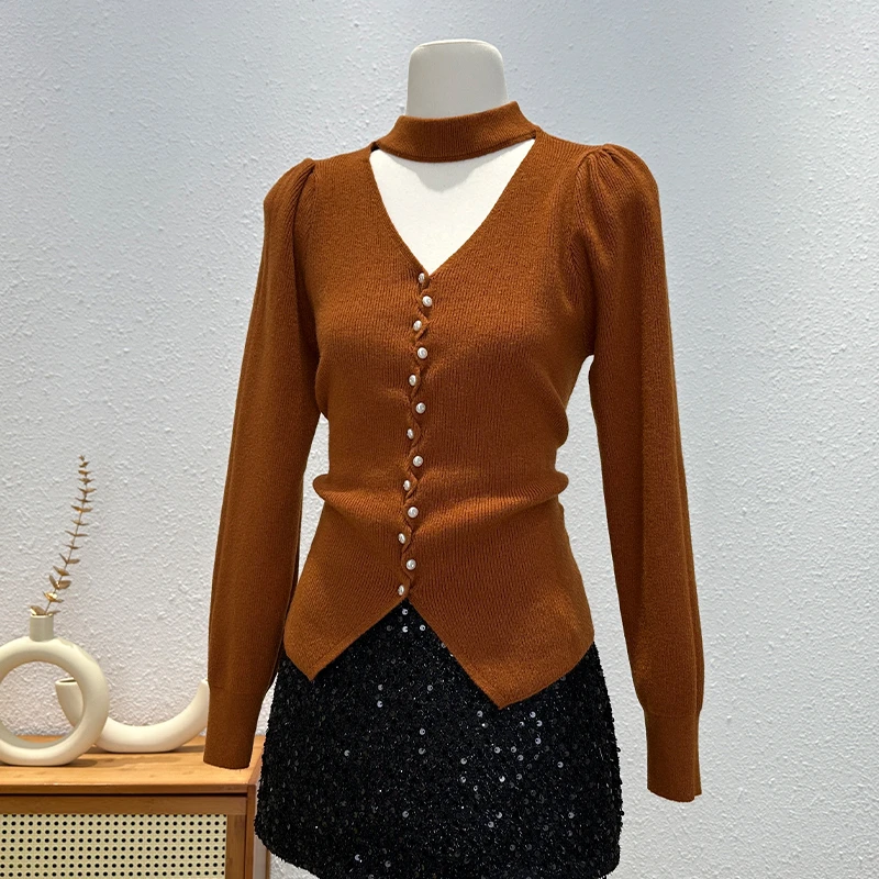 法式复古挂脖针织衫女秋冬季时尚泡泡袖镂空百搭毛衣独特流行上衣