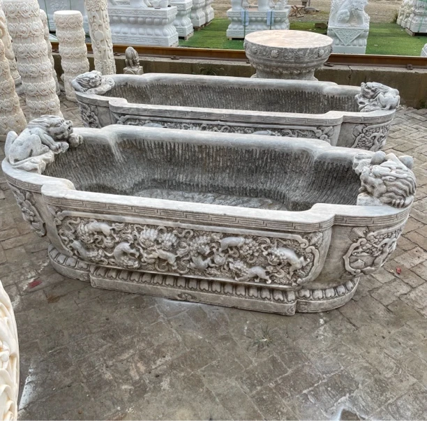 狮子滚绣球、八马骏图石槽，青白石，长2米宽85高65