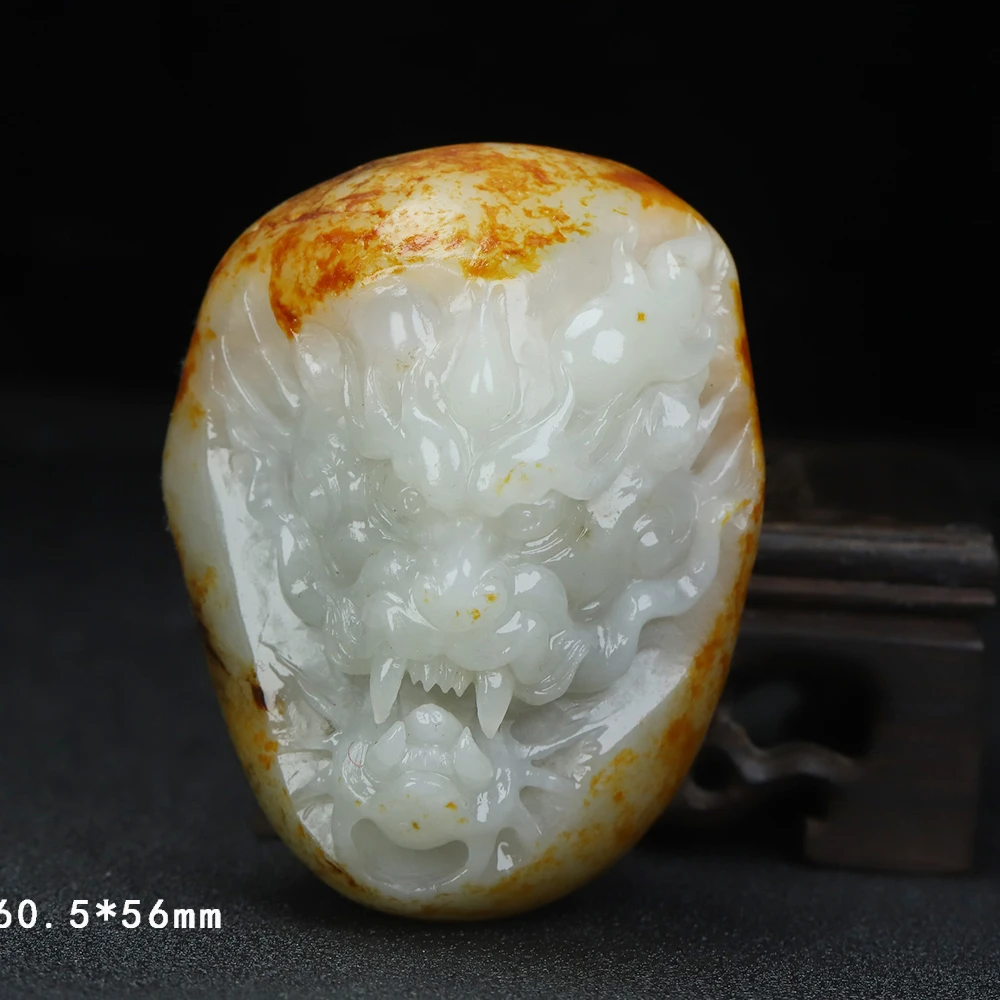 F49海川拍卖和田玉手把件