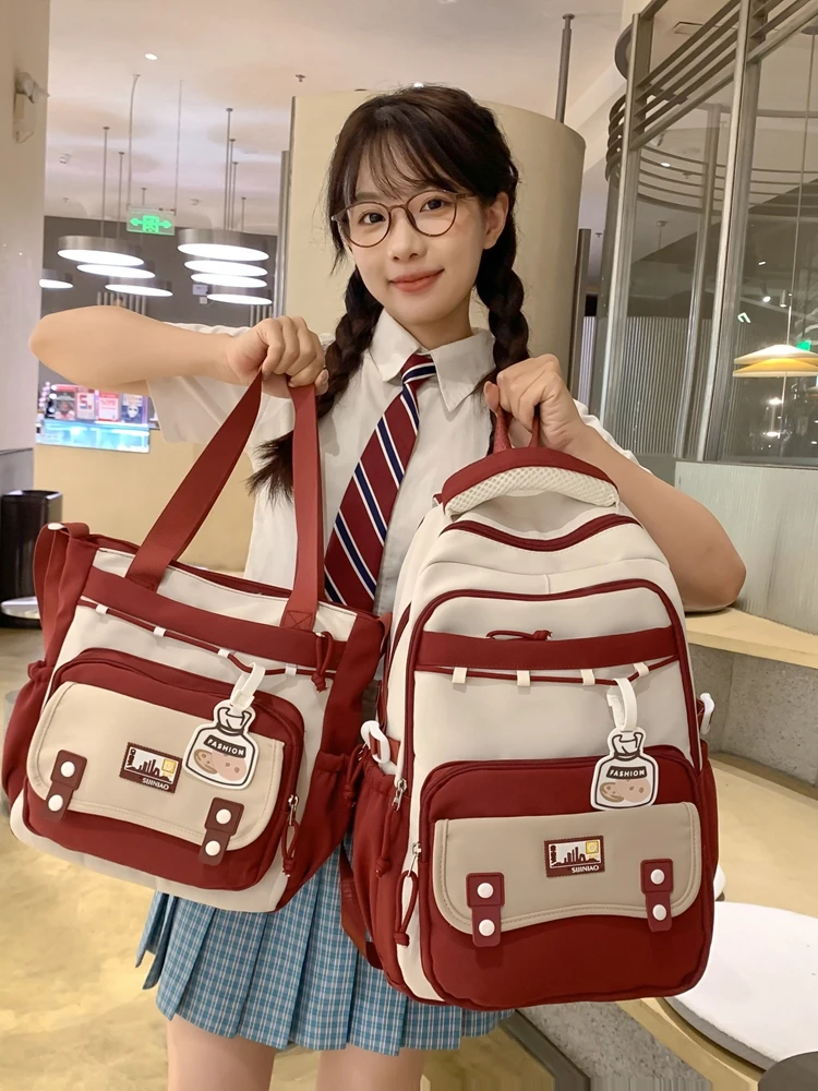 韩版高颜值工装书包轻便防水减负护脊背包女大容量时尚百搭双肩包